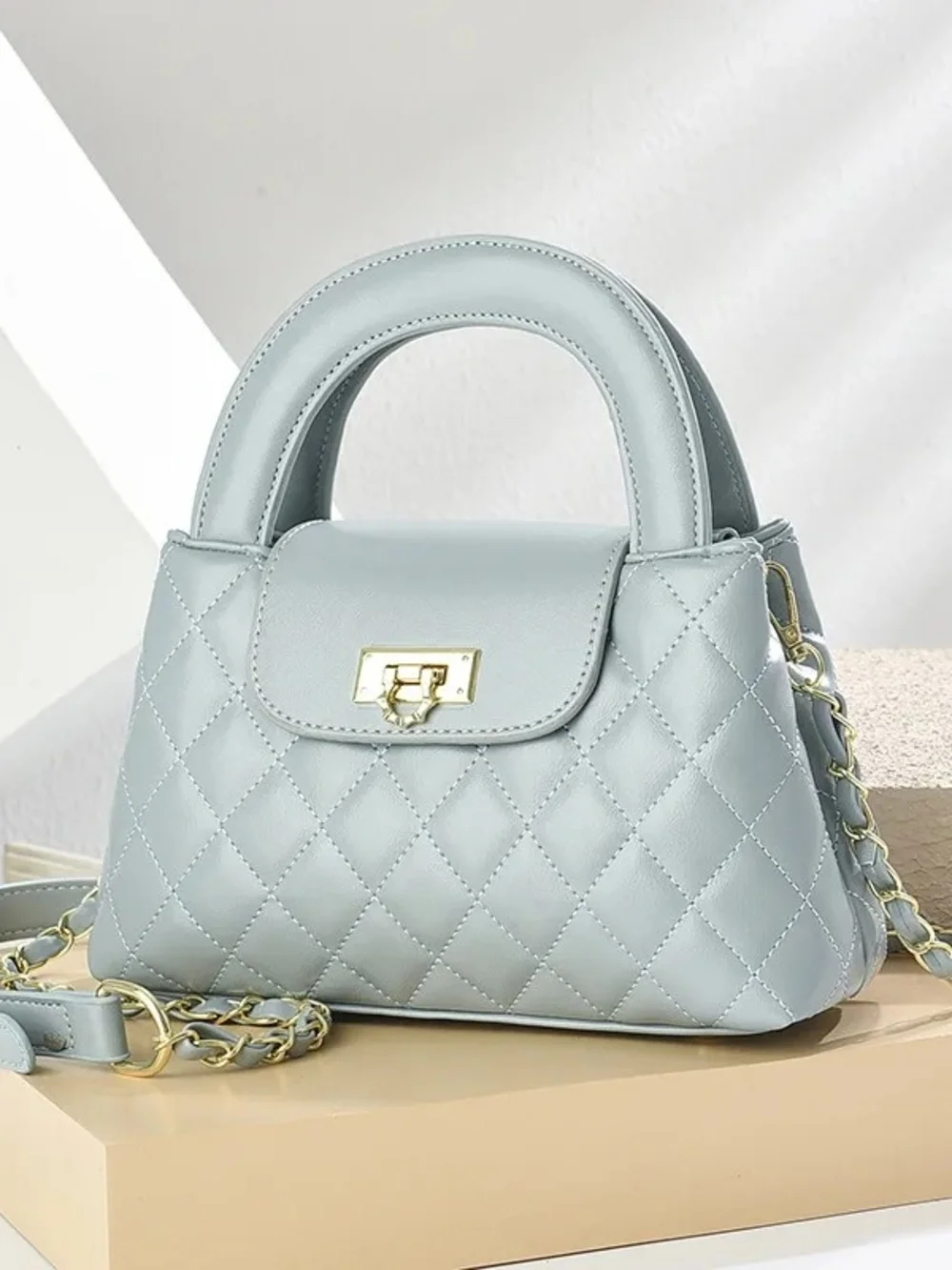Others Follow Quilted Mini Top-Handle Bag in Pale Blue with Gold Hardware